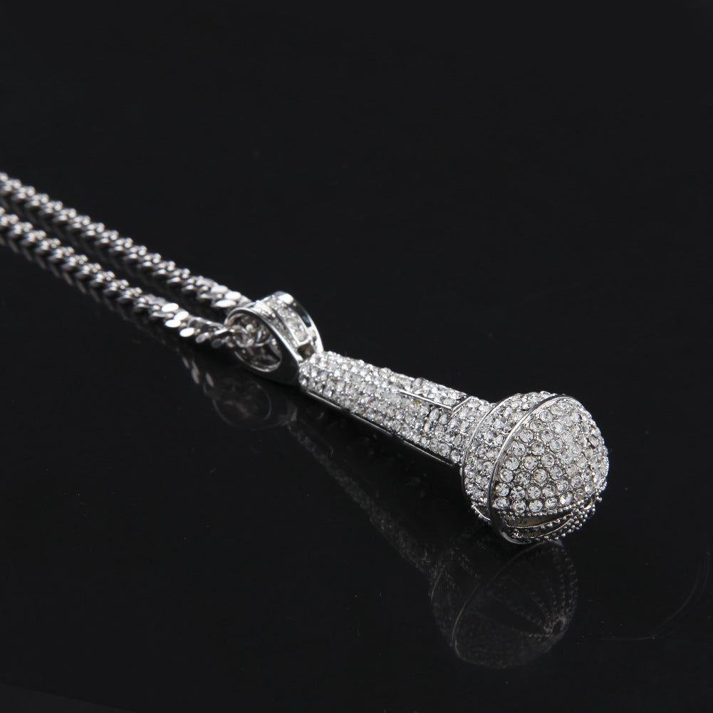 Hip-hop diamond-encrusted microphone necklaces.